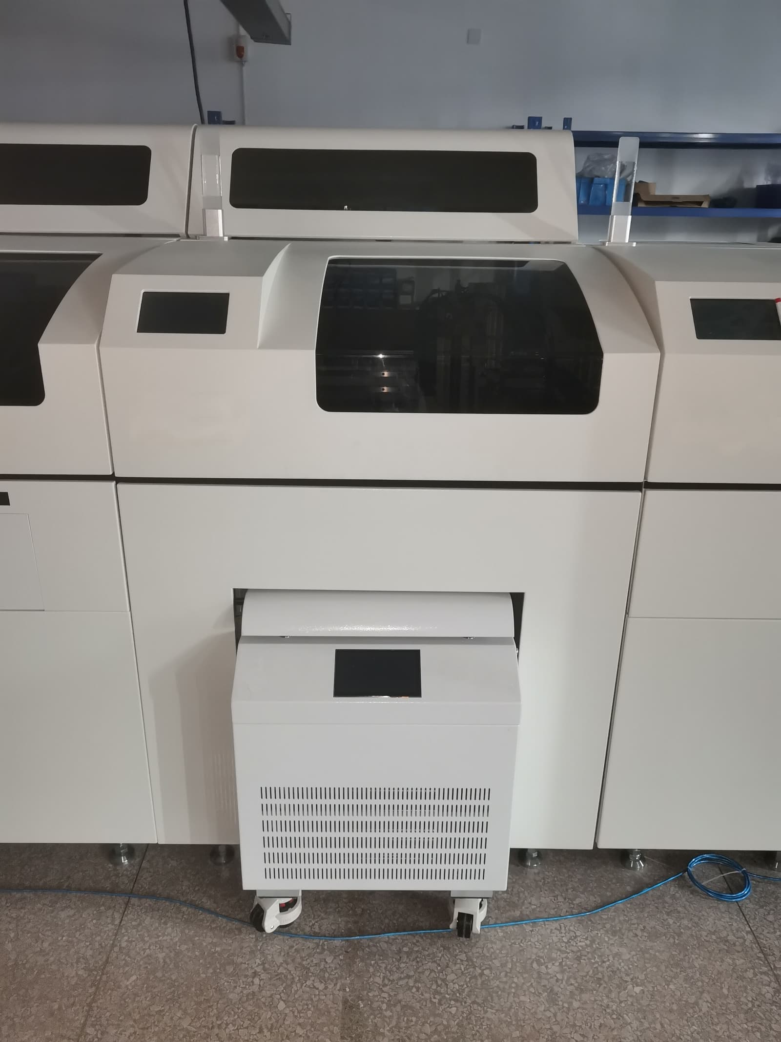 Javenlab JW-1066R positioning centrifuge integrated into an automated medical production line